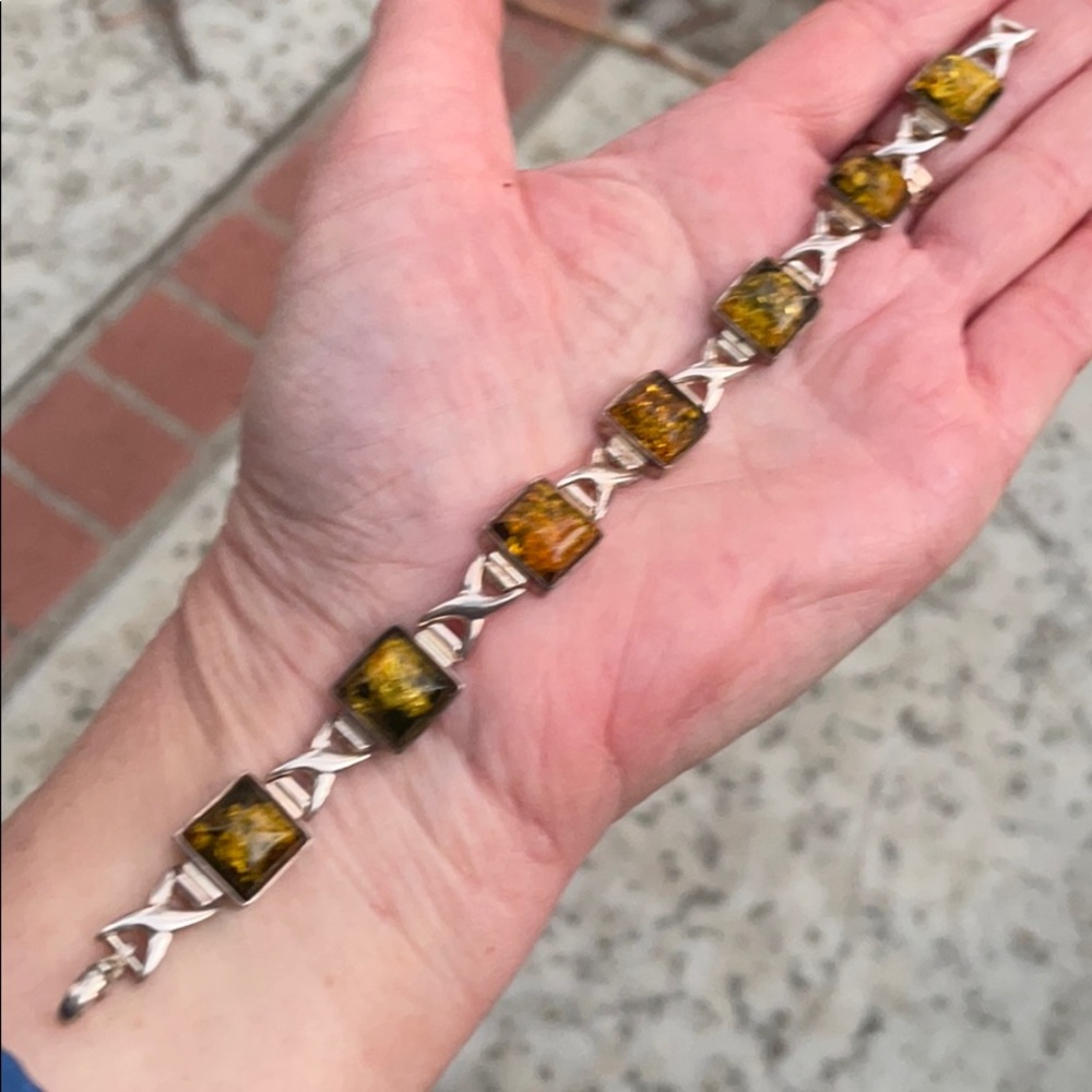 Antique sterling silver bracelet with green amber